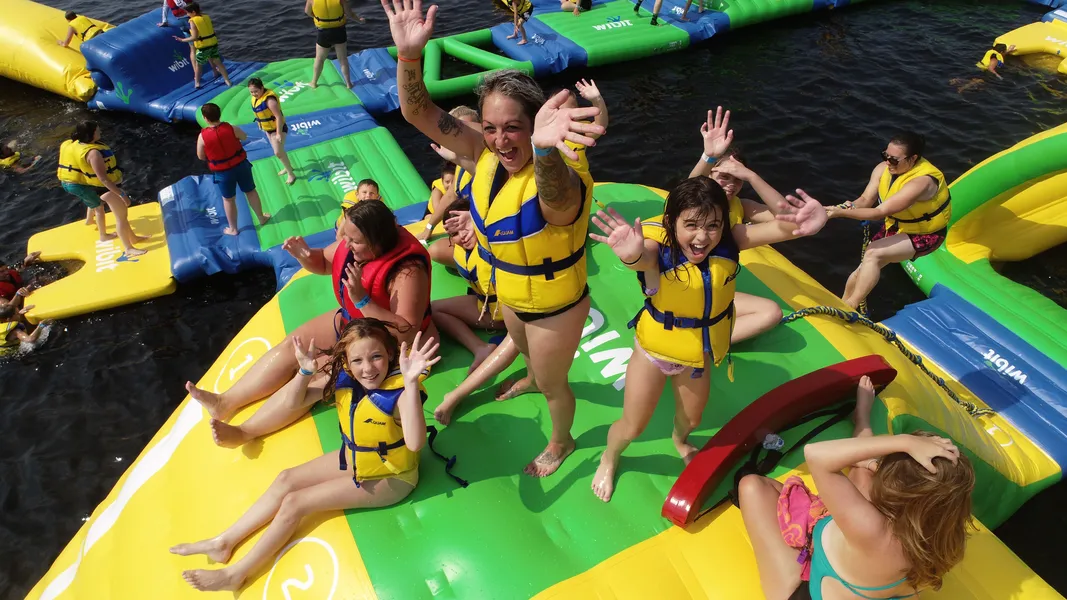 Splash N Go water park guests playing on inflatables